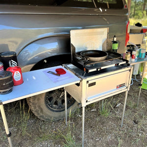 Compact Camp Kitchen Deployed for Cooking Meals