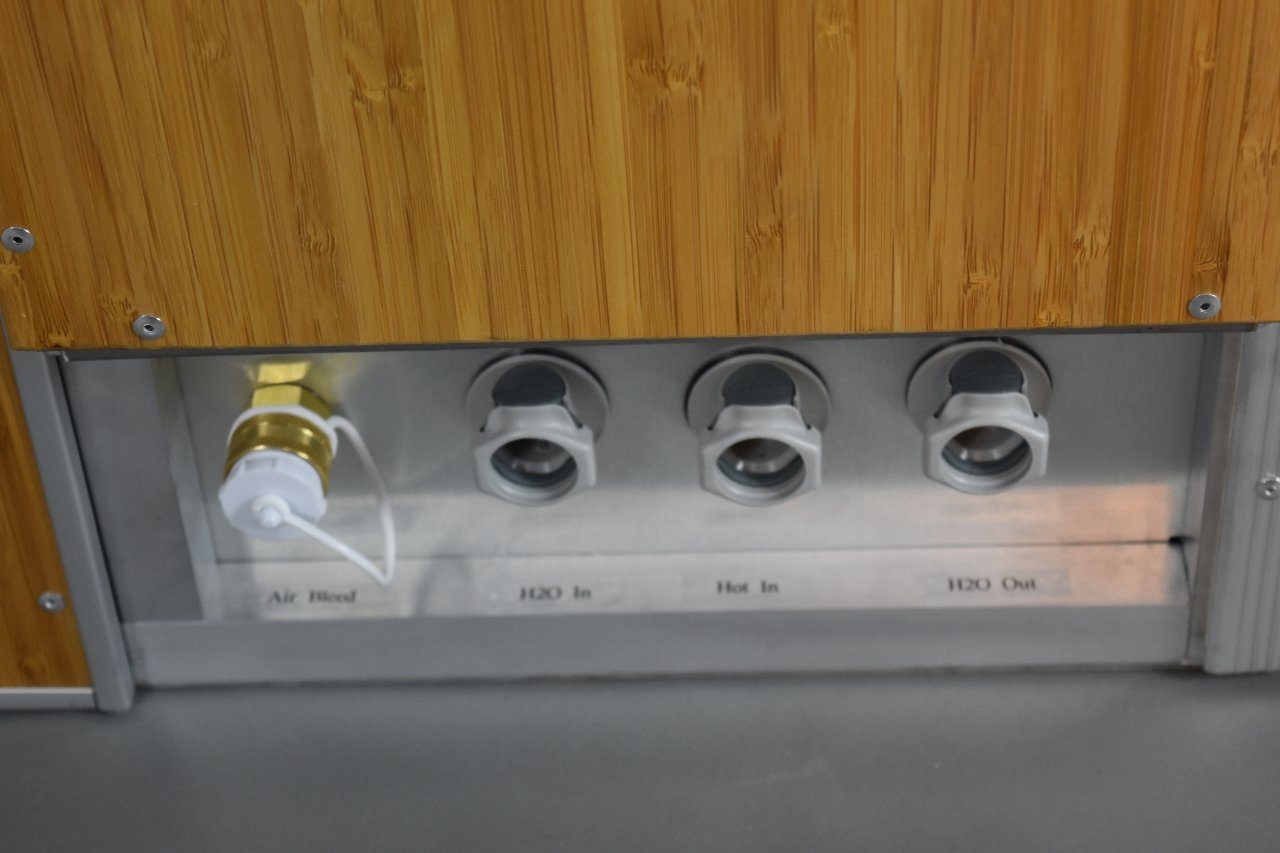 campervan water system with quick releases for fill and drain hoses
