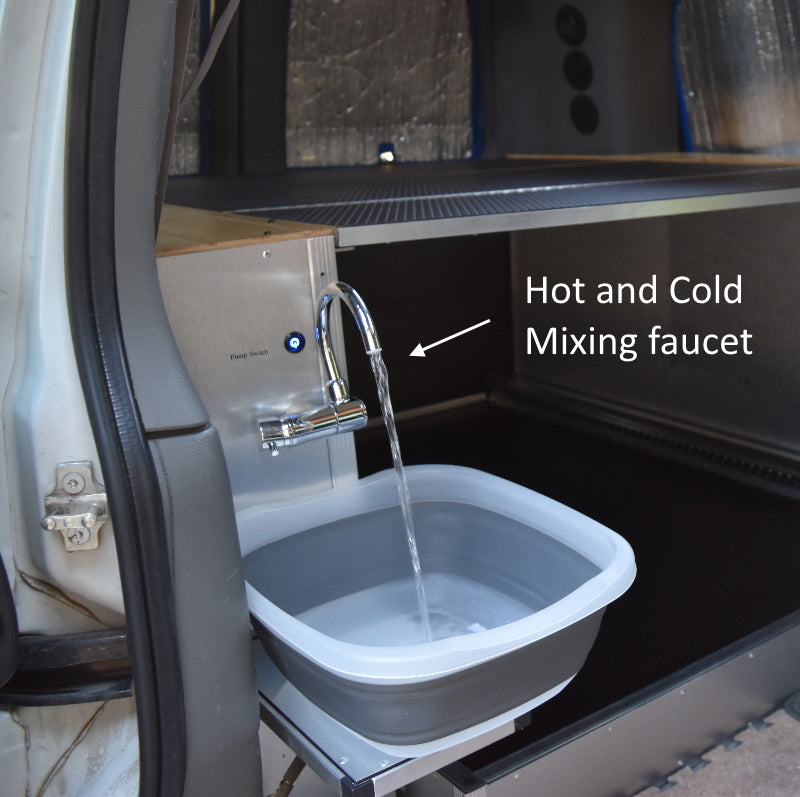 Wheel well cabinet with hot and cold water system