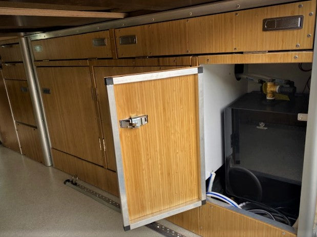 Optional Electric Hot Water Heater inside Van Cabinet