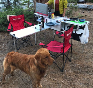 Add a table from Trail Kitchens being used in camp